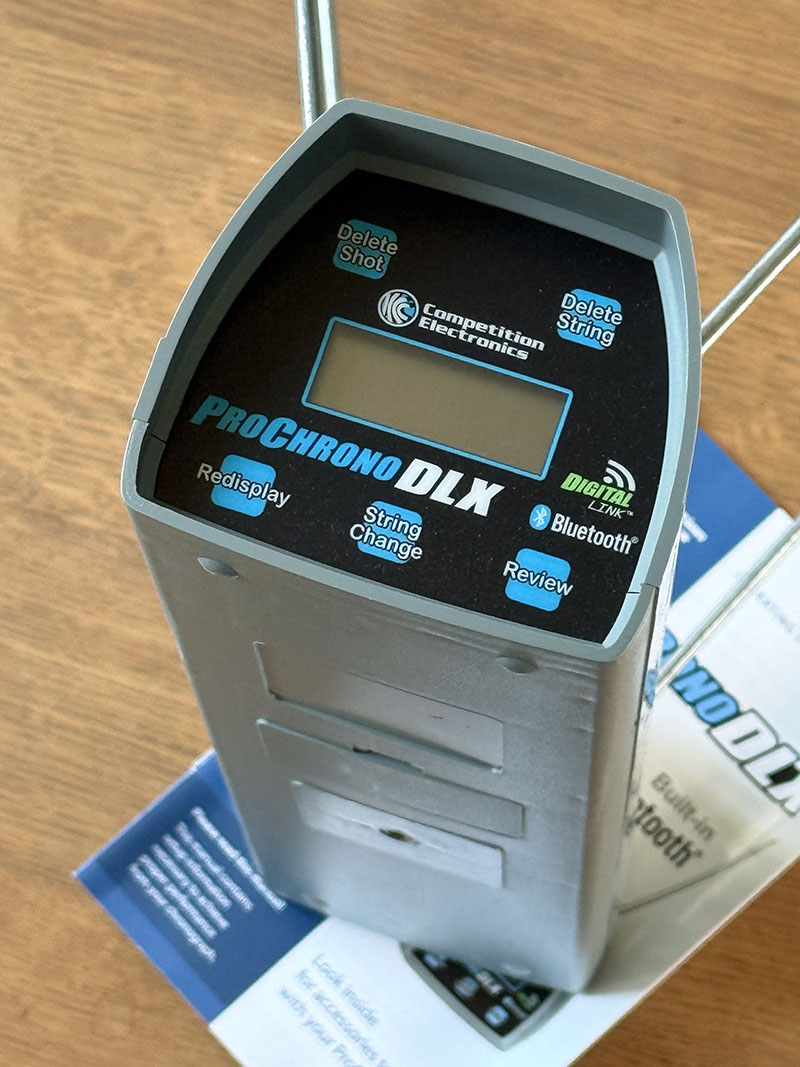 test ProChrono DLX : vue générale avant avec le mode d'emploi fourni en arrière plan